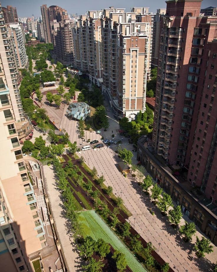 Shanghai Gubei Area expat neighborhood street with international restaurants and tree-lined streets